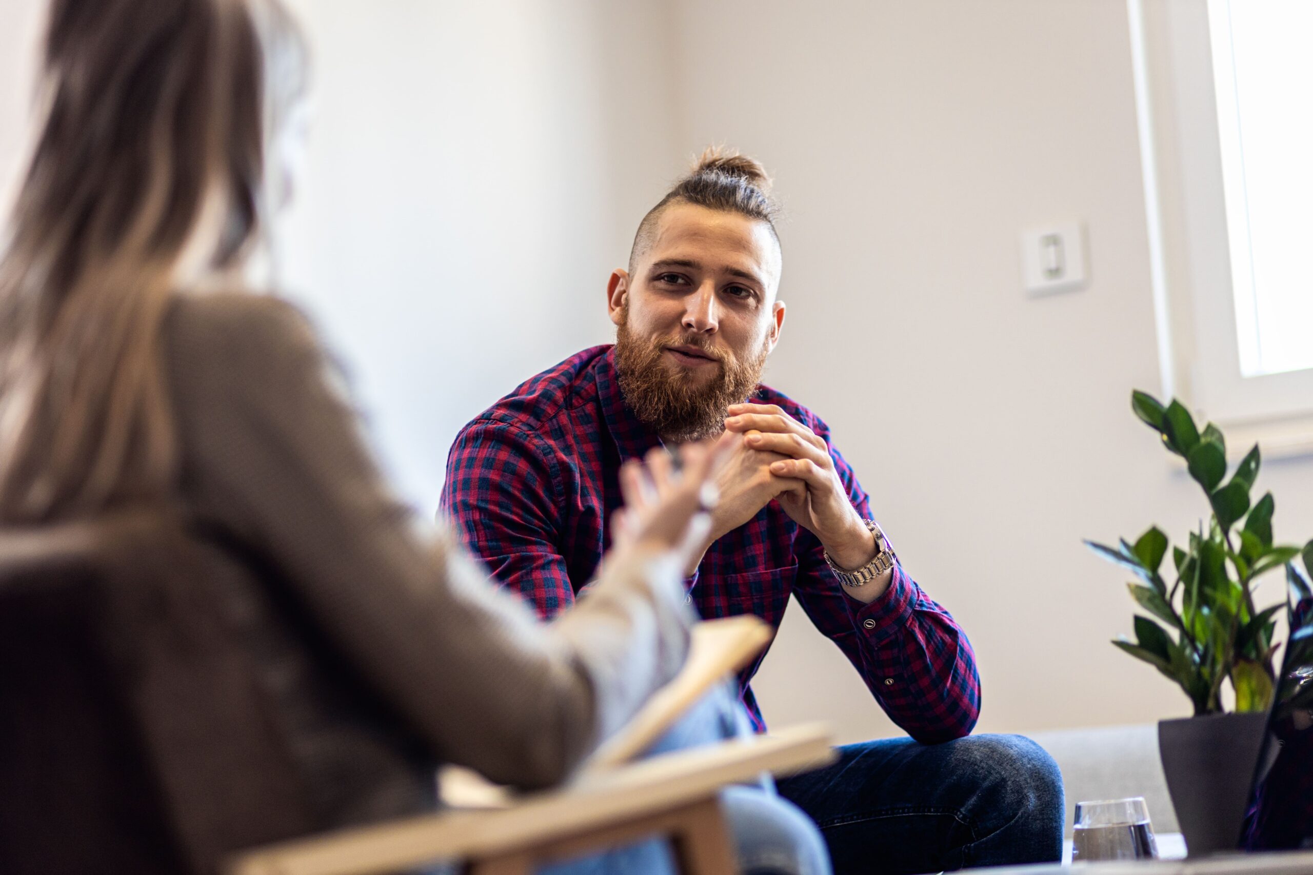 A man discusses the signs of fentanyl addiction with his therapist