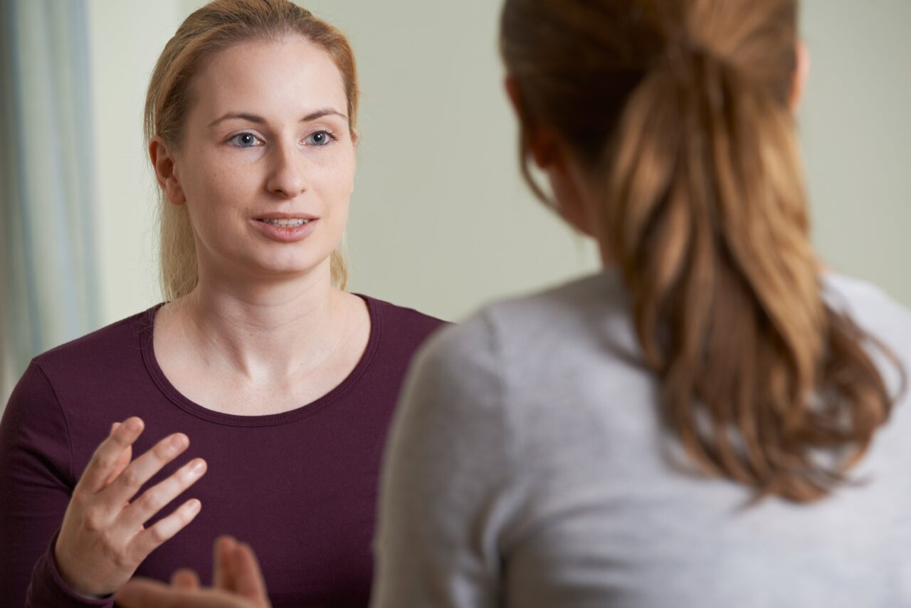 A woman opens up during counseling at central texas rehab