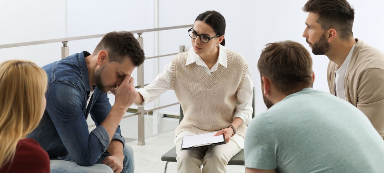 Supportive group therapy session during opioid addiction treatment in Austin, TX.