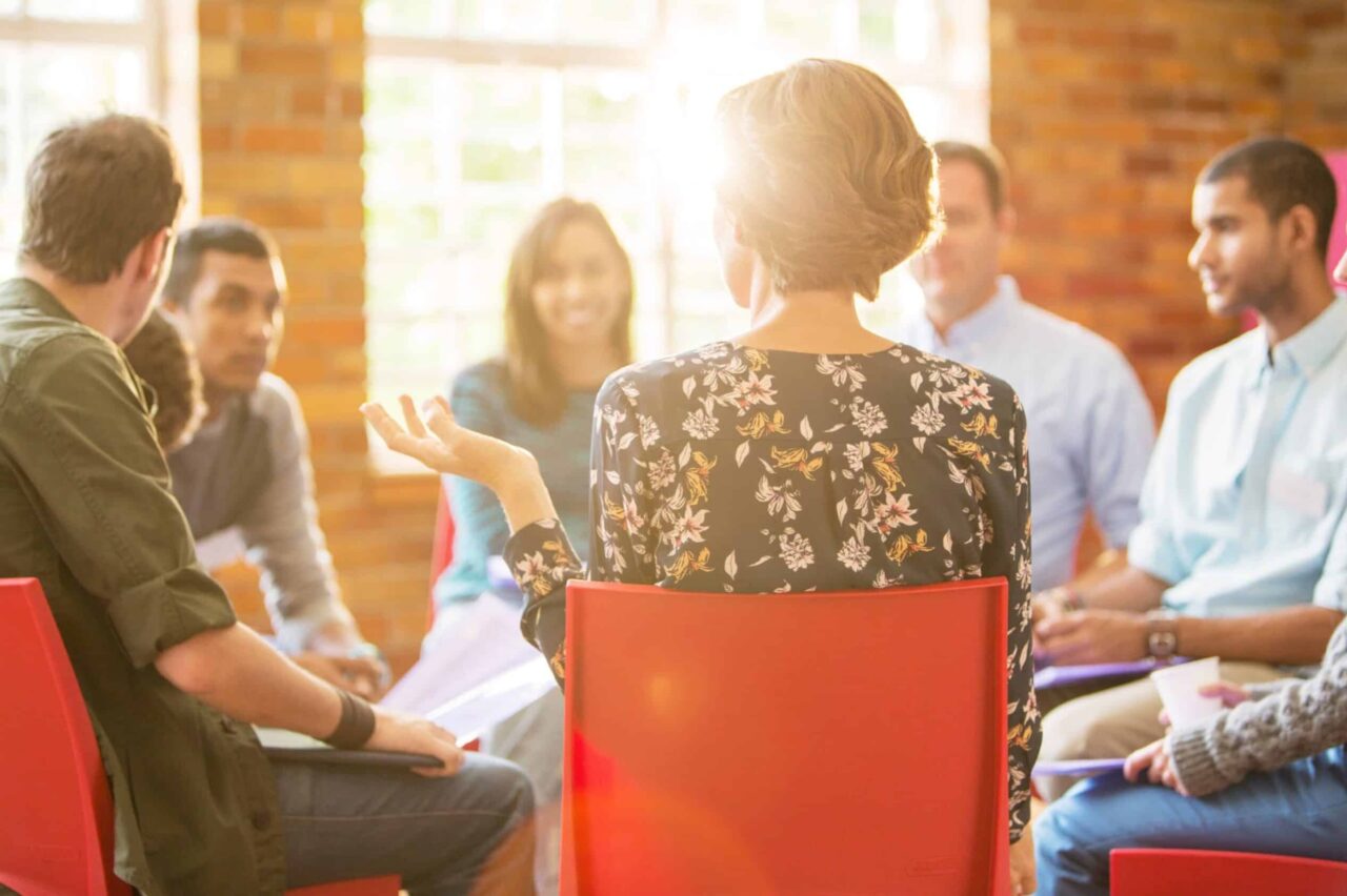 A group therapy session as part of Austin wellness program.