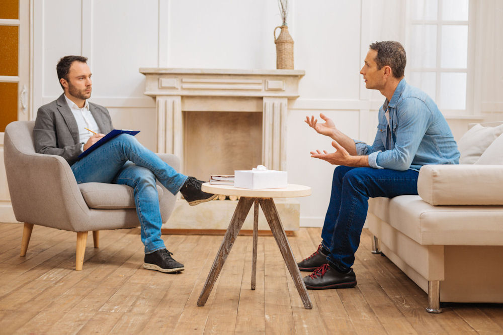 a-man-speaking-in-individual-therapy